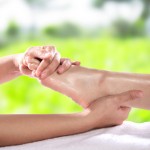 Enjoying and relaxing healthy foot massage close up